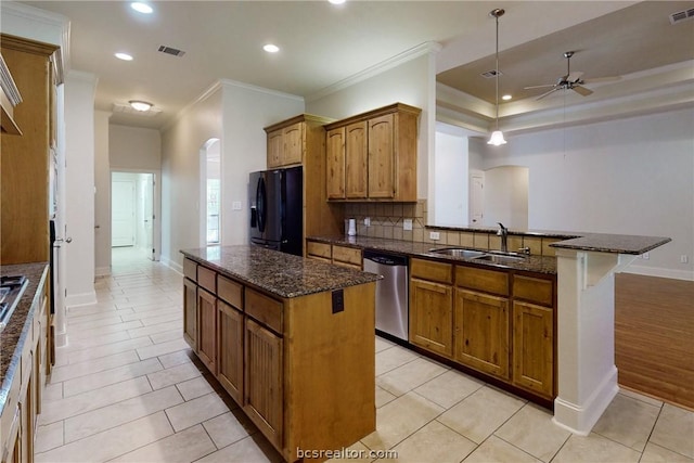 kitchen with stainless steel dishwasher, ornamental molding, black fridge with ice dispenser, ceiling fan, and sink