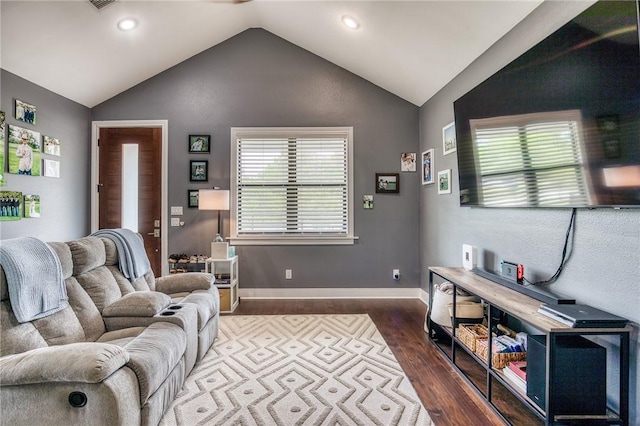 living area featuring recessed lighting, baseboards, lofted ceiling, and dark wood-type flooring