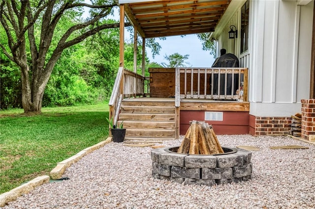 view of patio / terrace with an outdoor fire pit
