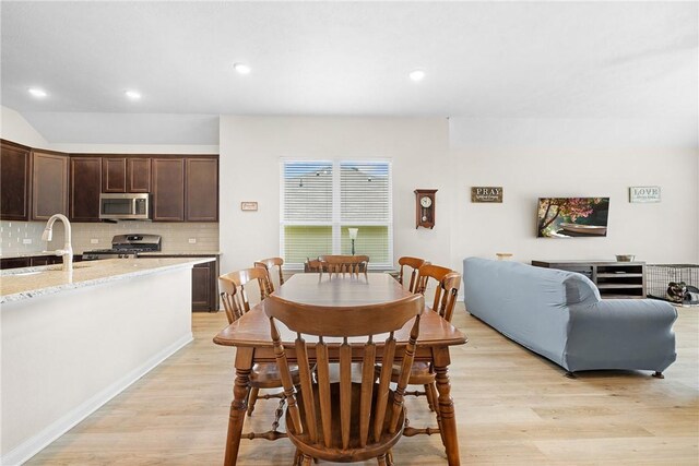219 Cross Ln, Caldwell, TX 77836 - dining space with light wood finished floors and recessed lighting