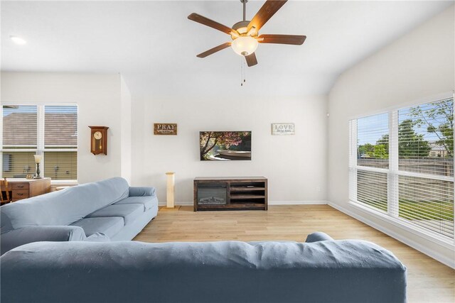 219 Cross Ln, Caldwell, TX 77836 - living room featuring wood finished floors, a ceiling fan, and vaulted ceiling