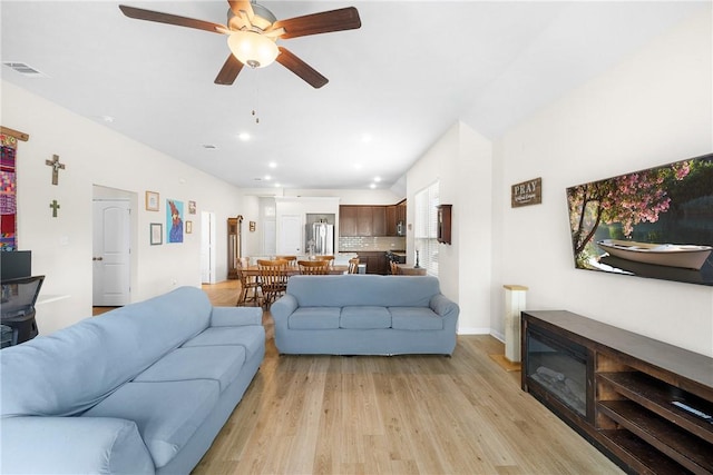219 Cross Ln, Caldwell, TX 77836 - living area with light wood finished floors, a ceiling fan, and recessed lighting