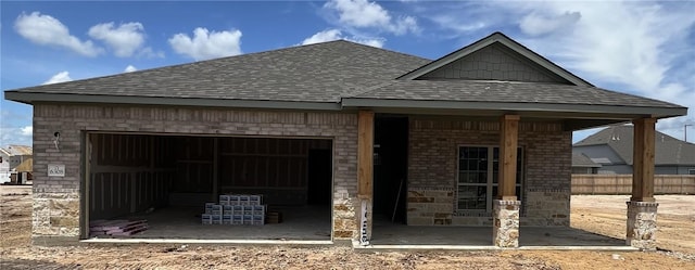 6308 Trado Dr, College Station, TX 77845 - view of front of property with brick siding, roof with shingles, and a garage
