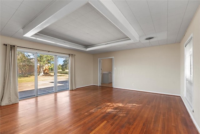 spare room with wood-type flooring