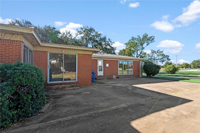 back of house featuring a patio area