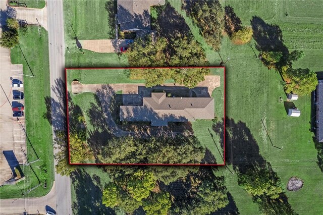 birds eye view of property featuring a rural view