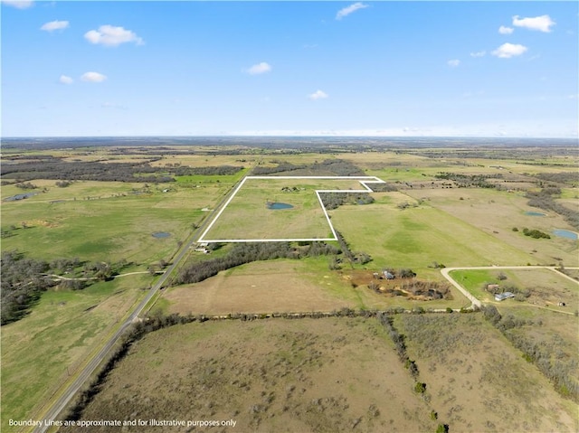 drone / aerial view featuring a rural view