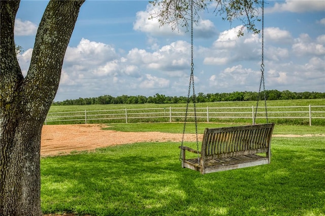 18222 N Fm 486, Buckholts, TX 76518 - view of community featuring a lawn, a rural view, and fence