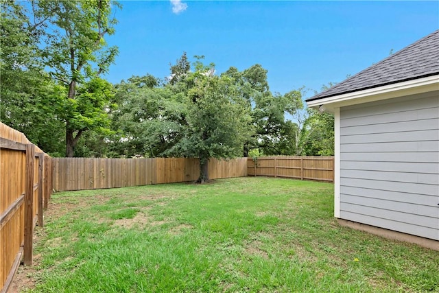 view of yard featuring a fenced backyard