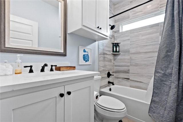 2607 Southside Dr, Bryan, TX 77803 - bathroom featuring vanity, toilet, and shower / tub combo