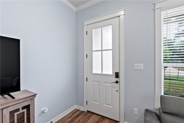 2607 Southside Dr, Bryan, TX 77803 - doorway with baseboards, ornamental molding, and dark wood-type flooring