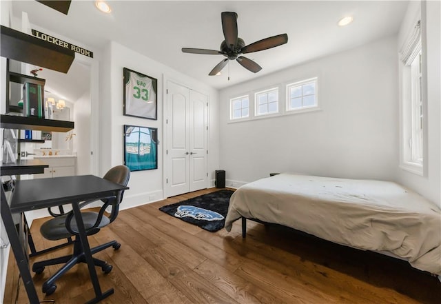 4231 Villaggio Ct, Bryan, TX 77802 - bedroom with wood finished floors, recessed lighting, and a closet