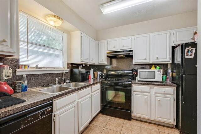 1008 Cedar Run, College Station, TX 77840 - kitchen with black appliances, under cabinet range hood, a sink, tasteful backsplash, and white cabinetry