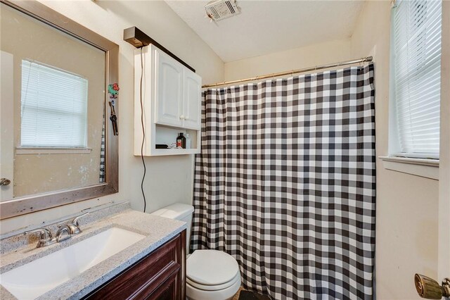 1008 Cedar Run, College Station, TX 77840 - full bath with toilet, healthy amount of natural light, and vanity