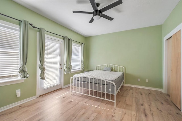 bedroom featuring ceiling fan and light wood-type flooring