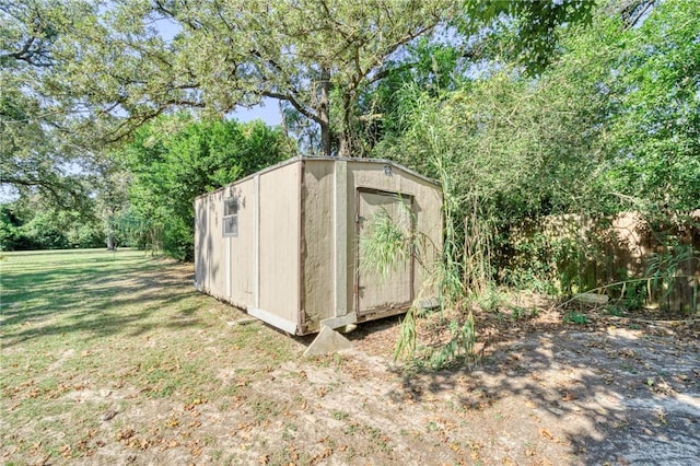 view of outdoor structure with a yard