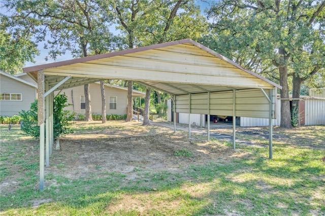 view of parking / parking lot featuring a carport