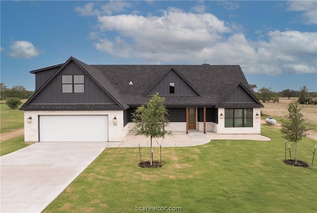 craftsman inspired home featuring a garage and a front lawn