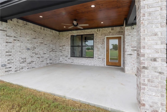 view of patio featuring ceiling fan