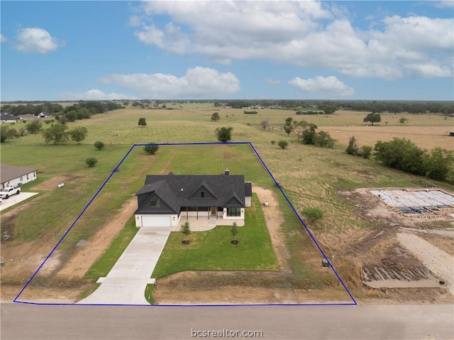 drone / aerial view featuring a rural view