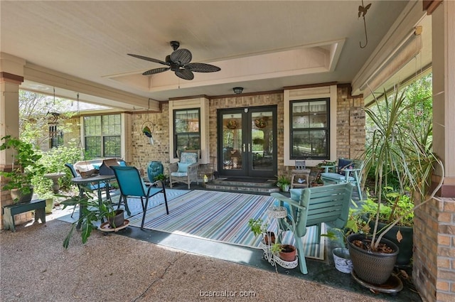 view of patio / terrace with ceiling fan and french doors