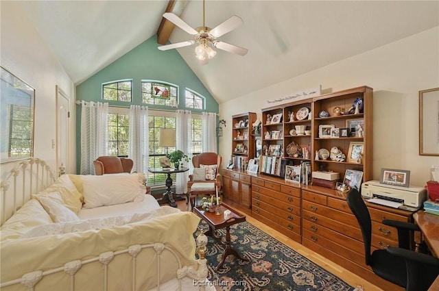 interior space featuring beam ceiling, hardwood / wood-style flooring, high vaulted ceiling, and ceiling fan