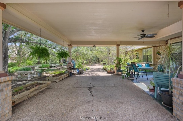 view of patio / terrace featuring ceiling fan