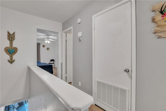 corridor featuring visible vents
