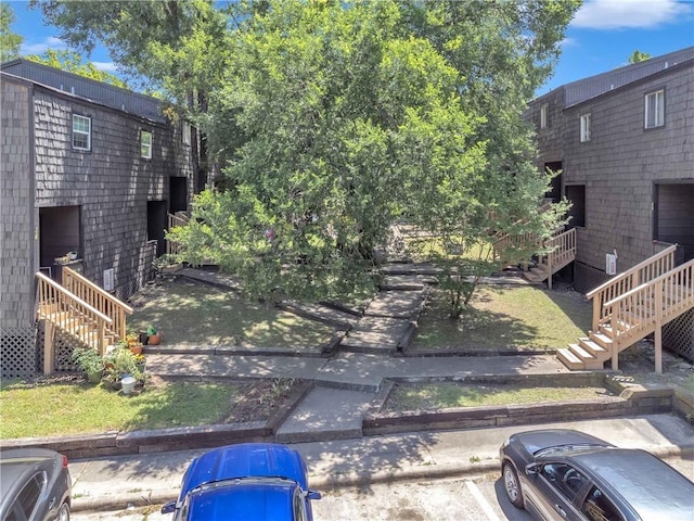 view of yard featuring stairs