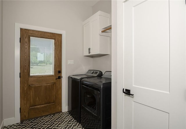 9159 Fm 1362 N, Caldwell, TX 77836 - laundry area featuring washer and dryer and cabinet space