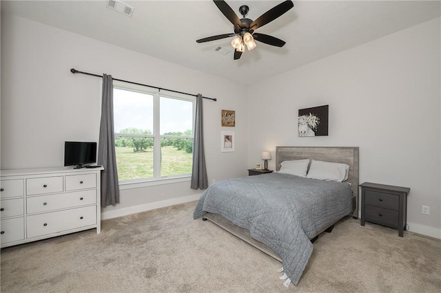 9159 Fm 1362 N, Caldwell, TX 77836 - bedroom featuring light carpet and ceiling fan