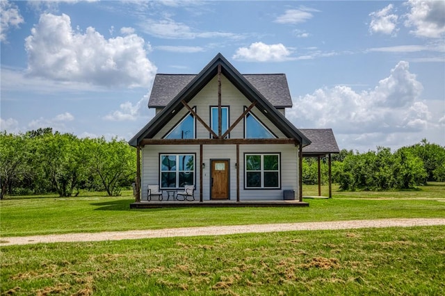 9159 Fm 1362 N, Caldwell, TX 77836 - view of front of property with a front lawn, a porch, and roof with shingles
