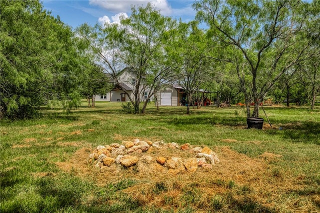9159 Fm 1362 N, Caldwell, TX 77836 - view of green lawn with a garage