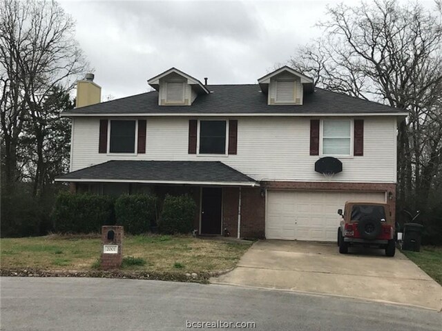 front of property featuring a garage