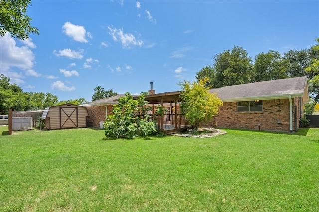 1905 Nueces Dr, College Station, TX 77840 - back of house featuring a shed, brick siding, and a wooden deck