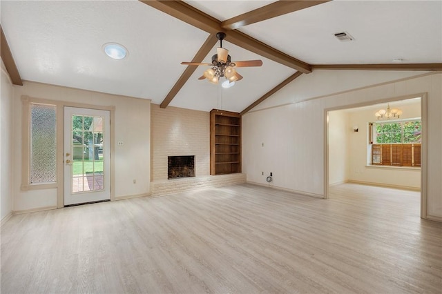 1905 Nueces Dr, College Station, TX 77840 - unfurnished living room featuring wood finished floors, ceiling fan, and healthy amount of natural light