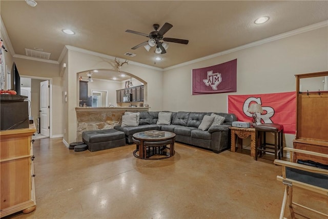 living room featuring ornamental molding and ceiling fan