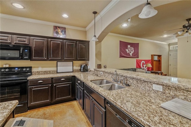 kitchen featuring sink, black appliances, crown molding, hanging light fixtures, and dark brown cabinetry