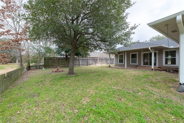 view of yard featuring a fenced backyard