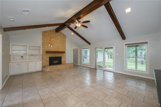 unfurnished living room with a fireplace, light tile patterned floors, visible vents, beamed ceiling, and baseboards