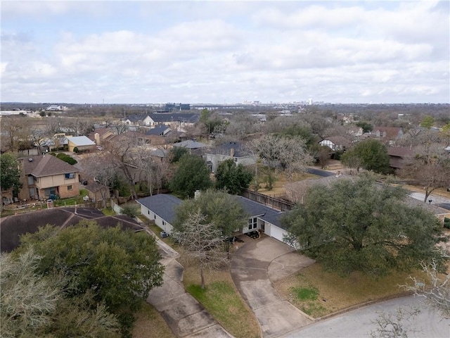 birds eye view of property with a residential view