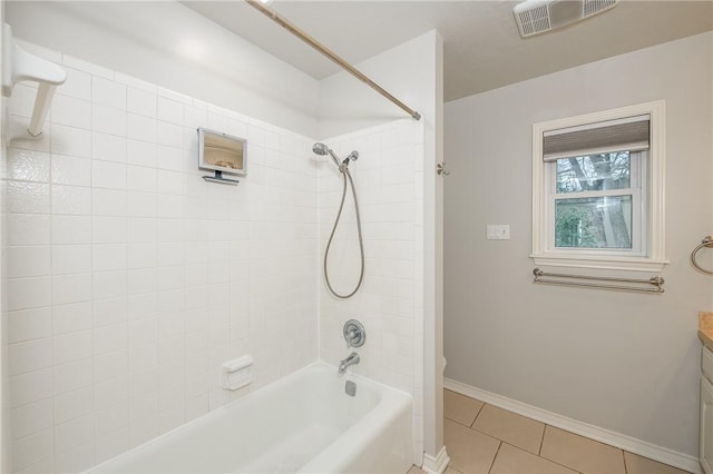 bathroom with bathtub / shower combination, visible vents, vanity, tile patterned flooring, and baseboards