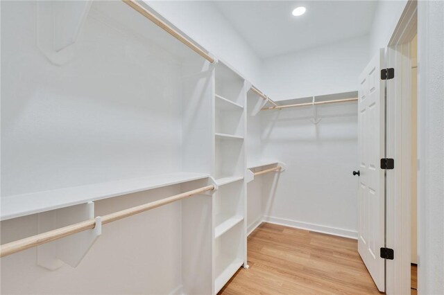 spacious closet with light wood-type flooring