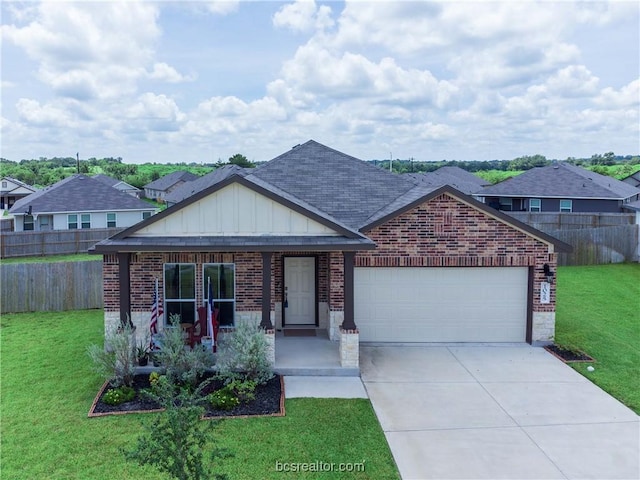 single story home with a front yard, a porch, and a garage