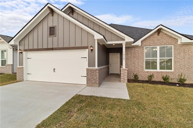 craftsman-style home featuring a garage and a front lawn