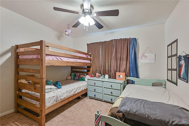 bedroom featuring ceiling fan and carpet floors