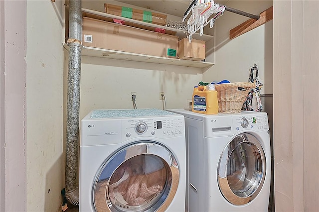 laundry area with washer and dryer