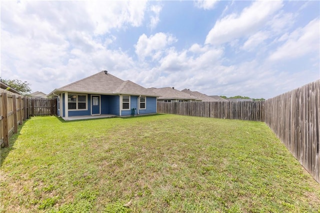 109 Dove Ct, Navasota, TX 77868 - back of property with a patio area
