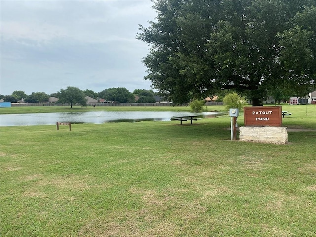 109 Dove Ct, Navasota, TX 77868 - view of community featuring a water view and a yard