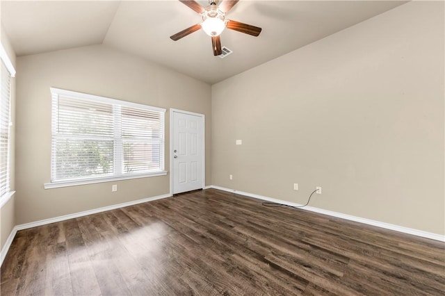 109 Dove Ct, Navasota, TX 77868 - unfurnished bedroom with vaulted ceiling, dark wood finished floors, baseboards, and a ceiling fan